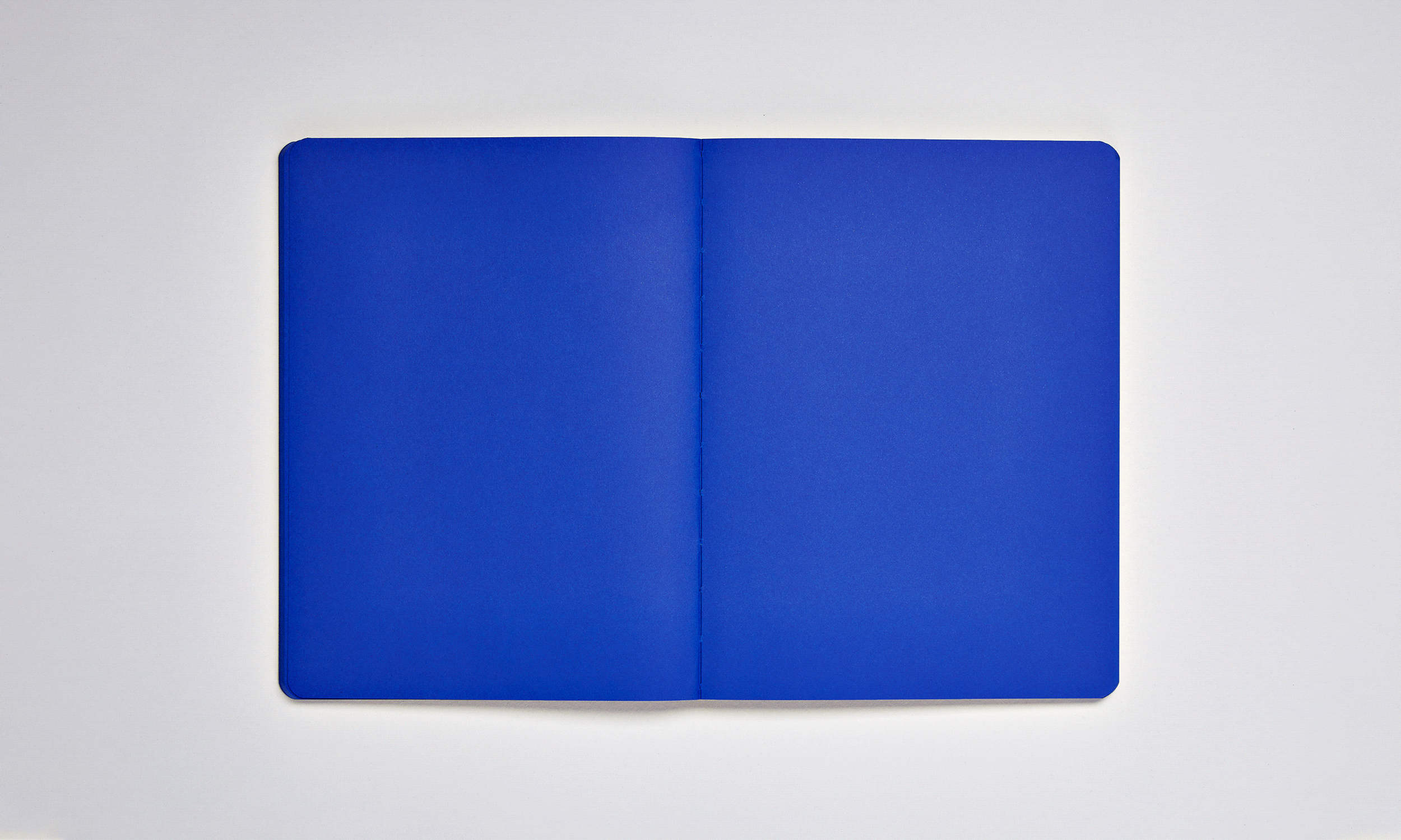 NUUNA Notizbuch Set Not White L Light BLAU,  165 × 220 mm  mit Gummiband und Stift