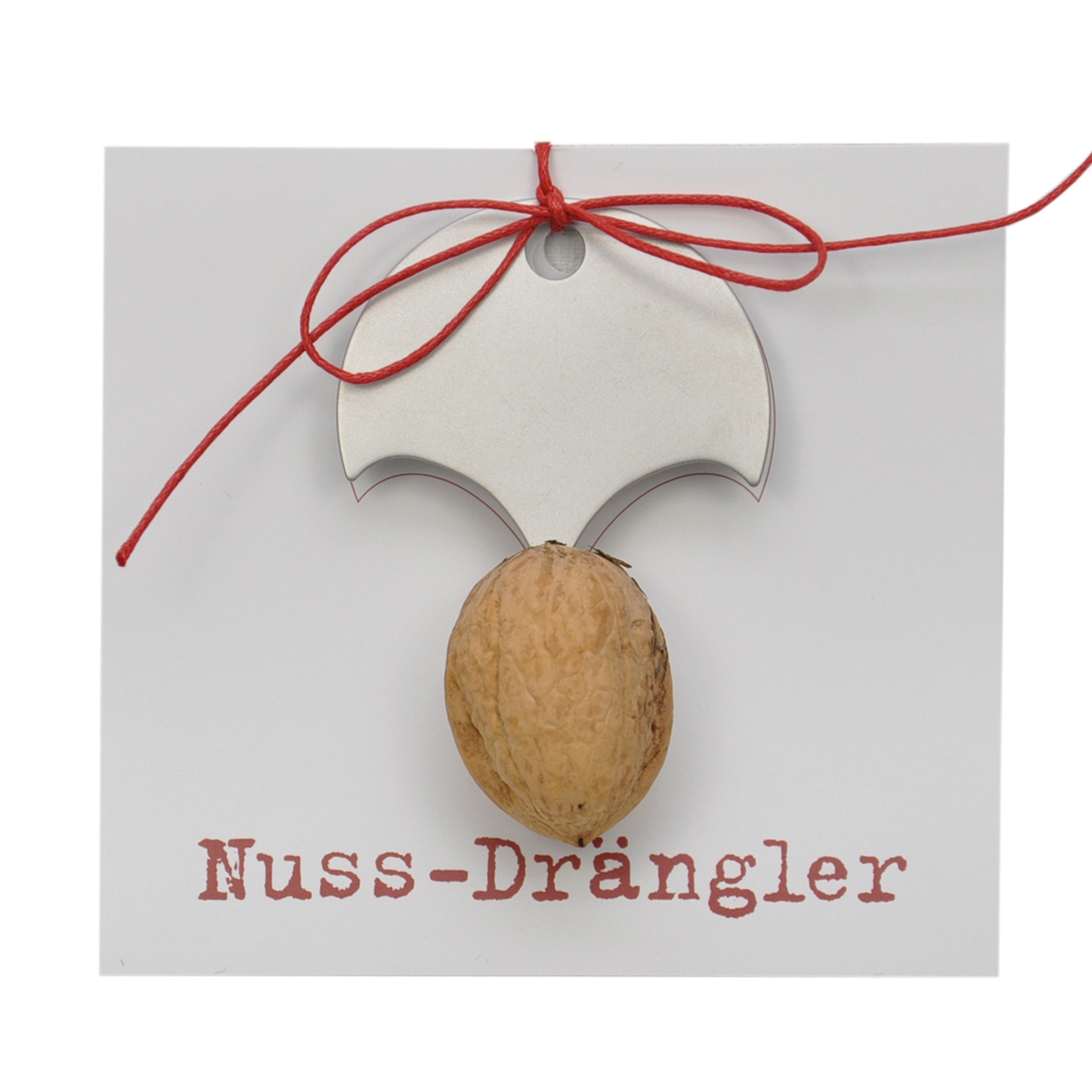 Nuss-Drängler mit einer Nuss und rotem Band  von Raumgestalt 