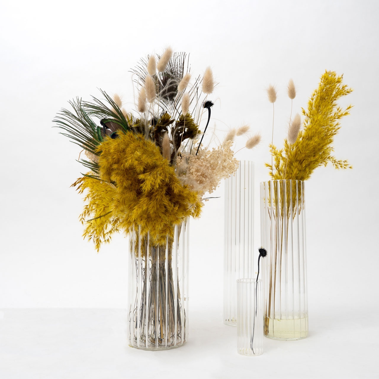 Raumgestalt  Vasenset Josef aus gewelltem Borosilikatglas, 4er Set, Ø 4,6,8 und 10 cm von Raumgestalt