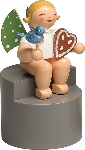Wendt & Kühn Engel mit Lebkuchen und Vogel, auf Podest, braune Haare