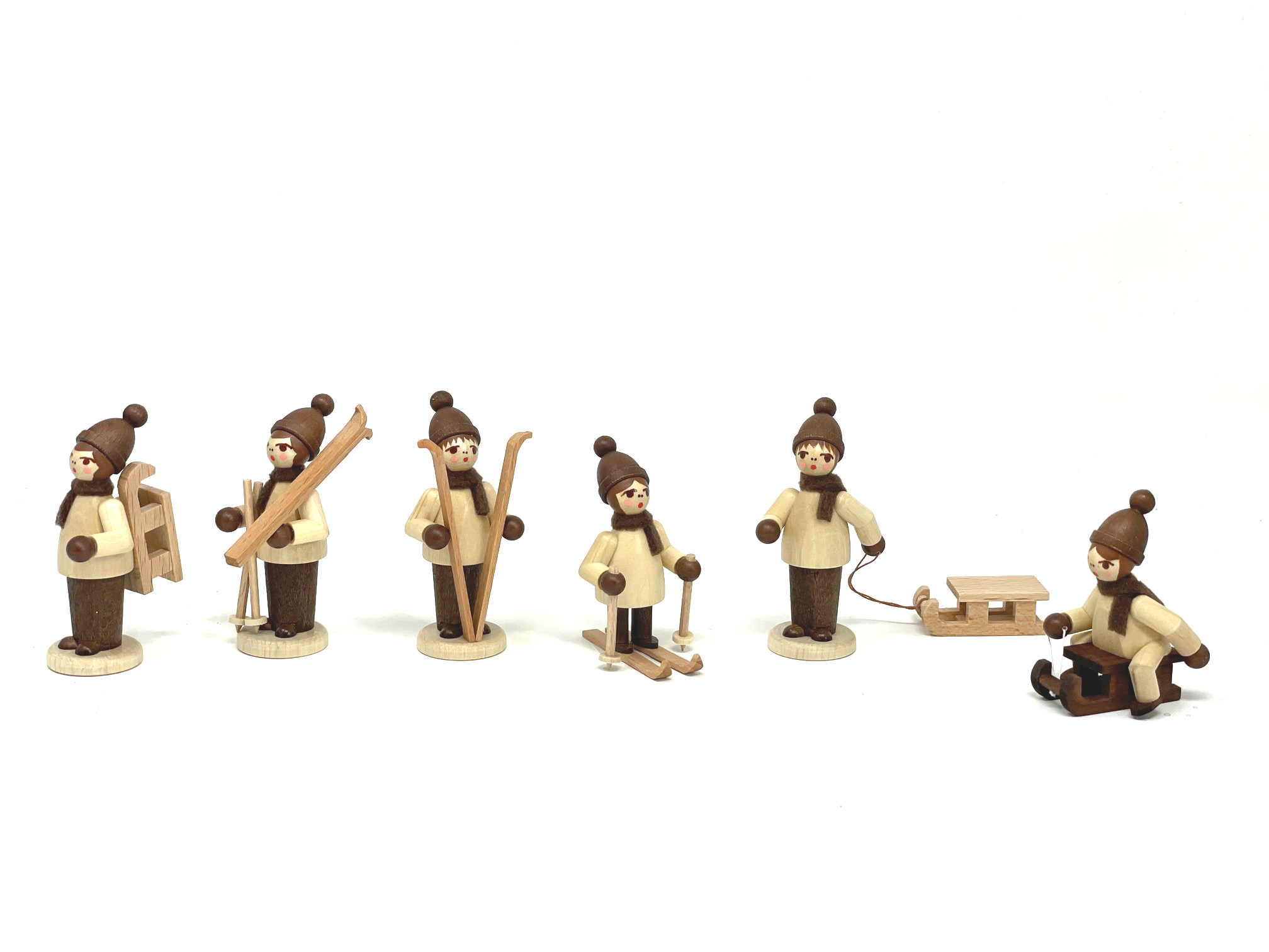 Erzgebirge Figur" Wintersport" Nr. 3, Figur mit Schlitten, natur, ca. 6 cm , zum Stellen 