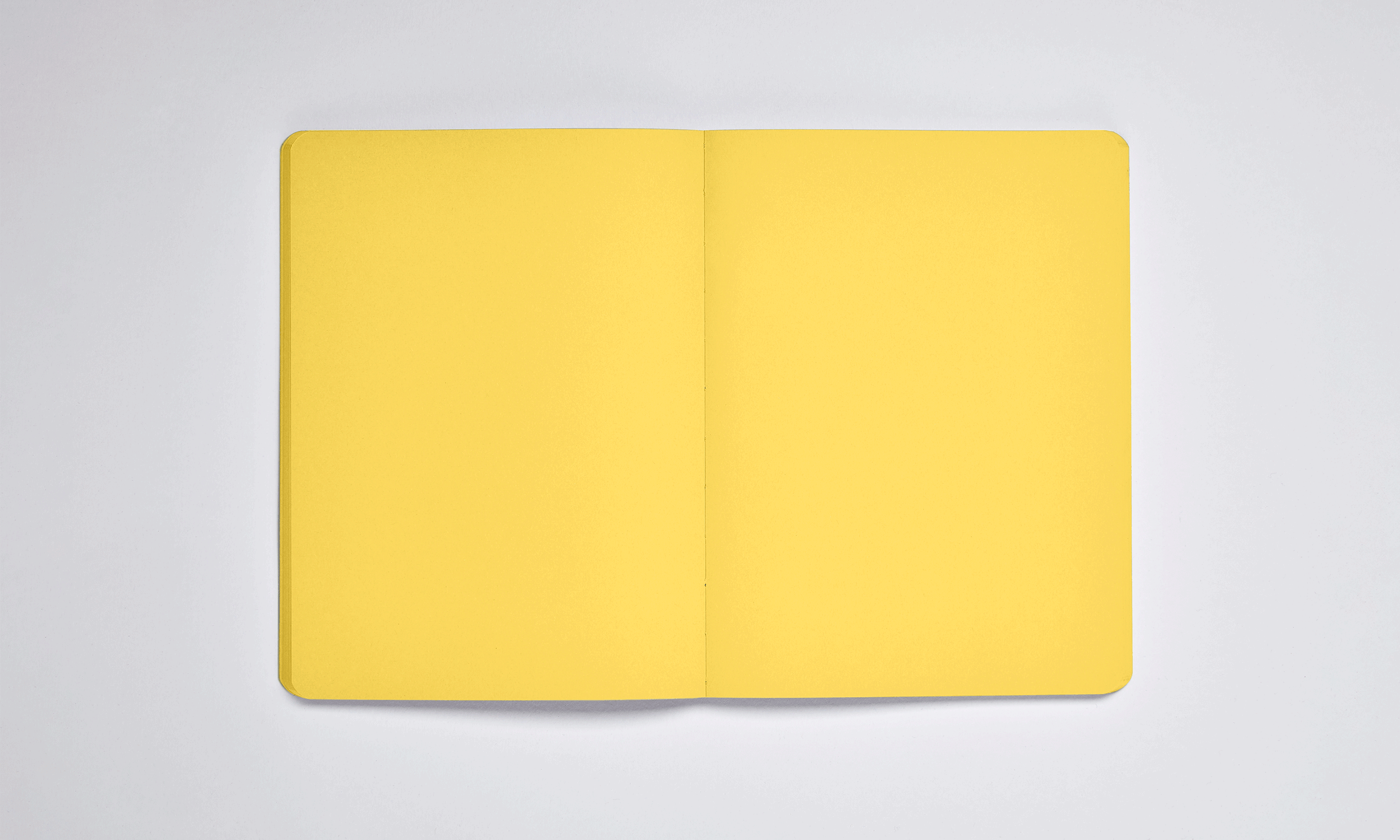 NUUNA Notizbuch im Set Not White L Light GELB,  165 × 220 mm mit Gummiband und Stift